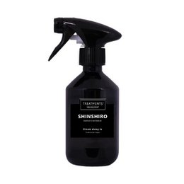 A 300 ml room spray in the Shinshiro scent from the Treatments® brand. The spray bottle has a black color and a trigger sprayer.