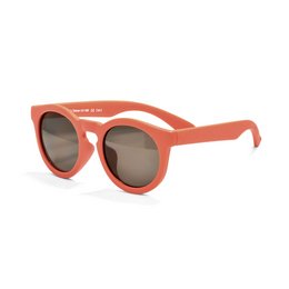 Red-framed kids' sunglasses with a chill canyon design.