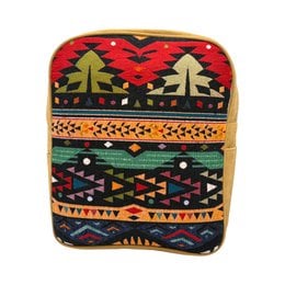 A large, tan backpack with a colorful, patterned front panel featuring geometric shapes and designs in red, green, and black. The backpack has a zipper closure and adjustable straps.