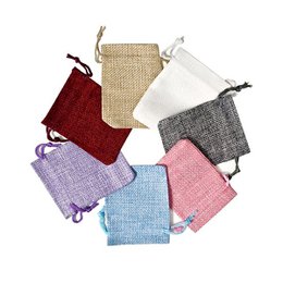  A set of 20 microfiber jewelry pouches in beige and pink colors, available in 8x8cm and 10x10cm sizes, suitable for storing and gifting small jewelry items.
