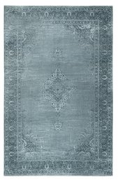  A large, rectangular area rug with a vintage, distressed pattern in shades of gray. The rug has a short, soft pile and is machine washable, making it suitable for living rooms.