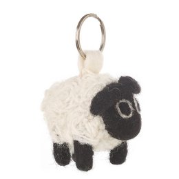 Handmade fair trade needle felt black sheep keyring. Soft, plush sheep-shaped keychain in black and white colors.