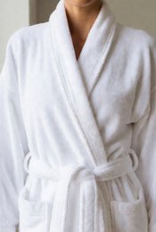  White terry cloth bath robe, soft textured fabric, wrap style with belt, classic design.