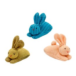 Colorful plush rabbit accessories, including a blue, yellow, and peach rabbit figurines. The rabbits have a soft, knitted texture and appear to be part of a larger collection or set.