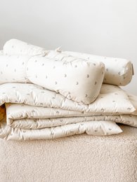  Beige changing mat with rainbow-colored polka dots, 200 cm long, made of protective material.
