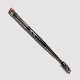 Black dual-ended brow brush for shaping and grooming eyebrows. Features a spoolie end for brushing and a angled end for precise application.