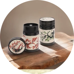 Decorative metal storage boxes with mandala pattern, available in two sizes, suitable for storing small items.