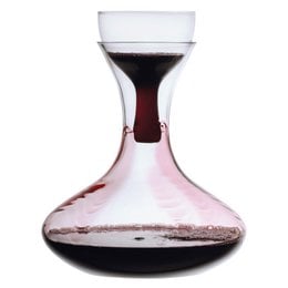 Elegant glass wine decanter with aerator for aeration and improved flavor. Tall, curved shape with wide opening for easy pouring. Suitable for red wines.