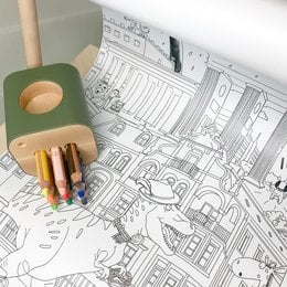 A colorful paint roller with urban jungle-themed motifs, suitable for kids' toys.