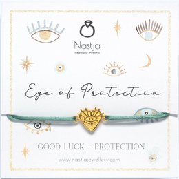 A gold-colored bracelet with a teal blue or ruby red cord, featuring a charm with an eye-shaped design and the text "Eye of Protection". The bracelet is designed for good luck and protection.