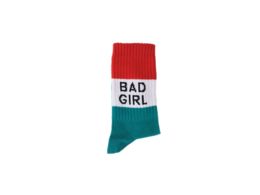 Black and white sneakers with "Bad Girl" text on socks, suitable for kids.