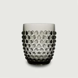 Acrylic drinking cup with a dotted, textured design in a gray color. Durable, lightweight, and unbreakable, making it ideal for use in the garden, on picnics, or for a playful look.