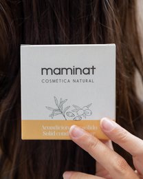 A solid, natural conditioner bar made with nourishing ingredients like avocado and coconut oil to condition and moisturize hair.