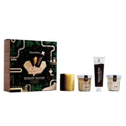 Vanilla Tonka beauty gift set with candle, body cream, and shower gel in a decorative box.