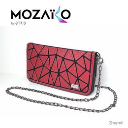 A red geometric patterned handbag with a chain strap. The handbag has a sleek, modern design with a structured shape.