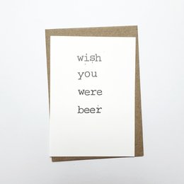 Wish you were beer - a humorous greeting card with a pun-based message printed on a simple white postcard design.