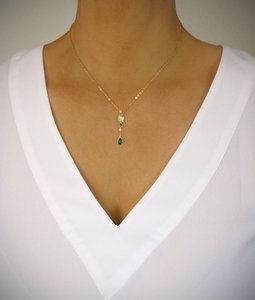 Peridot groene kristallen vlinder en smaragdgroene ketting