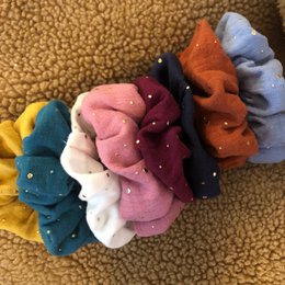 Scrunchie med en knivspids guld