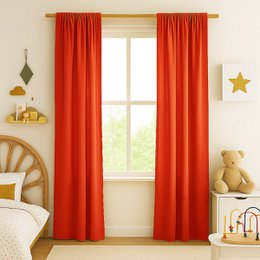 Bright orange cotton gauze curtains with a natural, textured appearance.