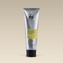  Soft exfoliating cleansing cream with AHA for cleansing and peeling. Cream-based product in a tube packaging.