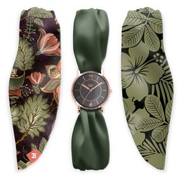 Elegant floral watch with rose gold accents and a green leaf-patterned strap. Features a sleek, minimalist dial design.