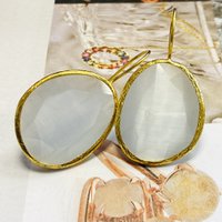 Earrings large cateye stone white