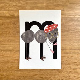 Whimsical card with stylized letter 'm' and polka dot accents.