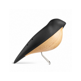 Large, decorative wooden bird figure in various colors including rose, grey, terracotta, sunglow, midnight blue, and black. Stylized, abstract design with a simple, minimalist shape.