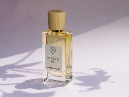 A 30ml bottle of 100% natural, Certified Natural Cosmos perfume called MYTHICAL IRIS.