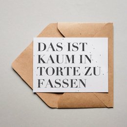 A birthday card with the text "That's hard to put into pie" in a playful, typographic style. The card is presented in a simple, minimalist envelope.