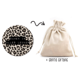 A round, leopard-print decorative object with a drawstring bag.