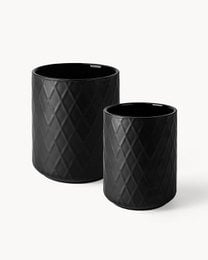 Two black and white ceramic dish racks with a diamond pattern design.