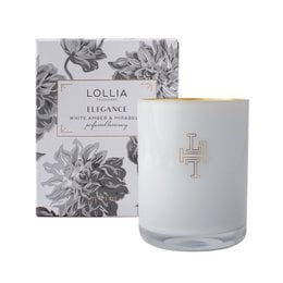 A tall, round white candle with a floral design on the packaging. The candle is scented and part of the Lollia Always in Rose collection.