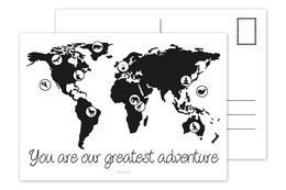 A black and white world map with the text "You are our greatest adventure" printed on it. The map features the continents and oceans in a minimalist style.