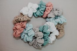  Set of 3 soft, comfortable muslin hair scrunchies in white, light gray, and red colors. Ideal for everyday use or styling hair.