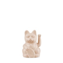 Ocher-colored ceramic figurine of a lucky cat with a raised paw, a traditional Japanese symbol of good fortune.