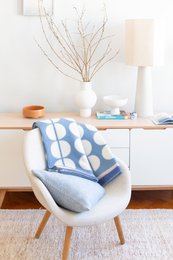  Cozy blue and white patterned wool blanket, perfect for adding a touch of warmth and style to any living space.