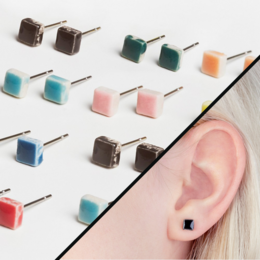 Ceramic stud earrings in various colors including kirschrot, himmelblau, schneeweiß, onyxschwarz, malachitgrün, sandrosa, zitronengelb, and multicolor. Minimalistic and sustainable design.