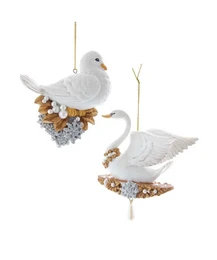  White dove and swan sitting ornaments. Decorative bird figurines with natural elements like twigs and berries.
