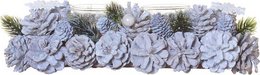 A decorative tealight holder featuring a cluster of white pinecone-shaped ornaments, surrounded by green pine branches, creating a festive and wintry display.