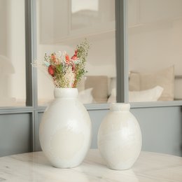 Elegant white ceramic vases with floral arrangements, available in big and small sizes, suitable for home decor.