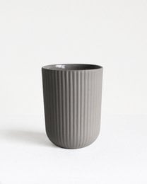 Dark gray ceramic mug with vertical ribbed texture, 150 ml capacity.