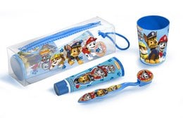 Paw Patrol dental travel kit with characters, includes toothbrush, toothpaste, and toiletry bag. Bright blue and red colors, featuring the Paw Patrol pups.