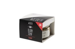 Dijon mustard in a glass jar with a black and red label. The jar contains a thick, yellow mustard paste.