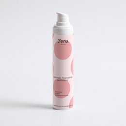  Fragrance-free nourishing day cream, white pump bottle with pink circular design, skincare moisturizer.