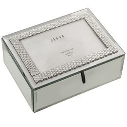 A mirrored jewelry box with a decorative crystal border. The box has a hinged lid and a storage compartment inside.