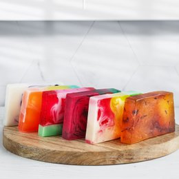 Bar soap with various scents including goat milk, blueberries-blackberries, chocolate, grapefruit, lavender, linden, watermelon, and more. Comes in 80g bars.