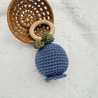 Handmade crocheted rattle with beech wood ring - blueberry