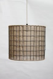 A cylindrical lampshade made of jute material, suitable for pendant lighting fixtures.