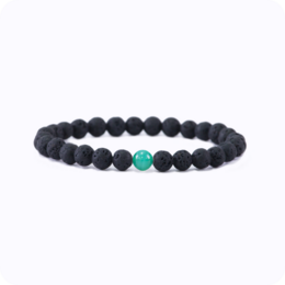 Green and black beaded bracelet with a turquoise accent bead, made of natural materials, suitable for unisex wear as a Christmas gift.